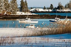 Fishing Boats in Snow Covered Owls Head Harbor in Maine